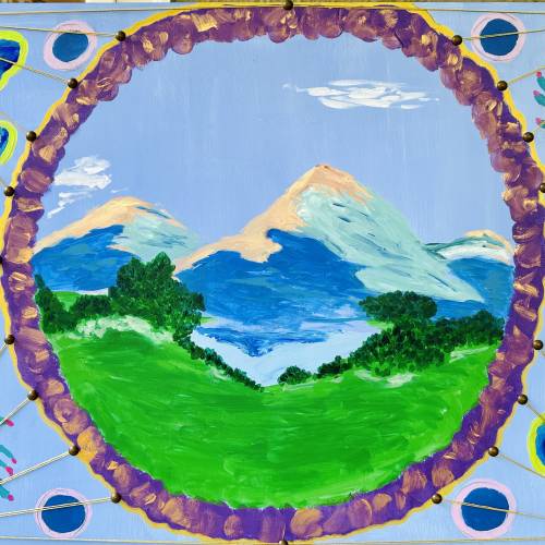 Artist Mignon Dupepe's piece, “Porthole of Peace,” which features a mountain range seen through a porthole.
